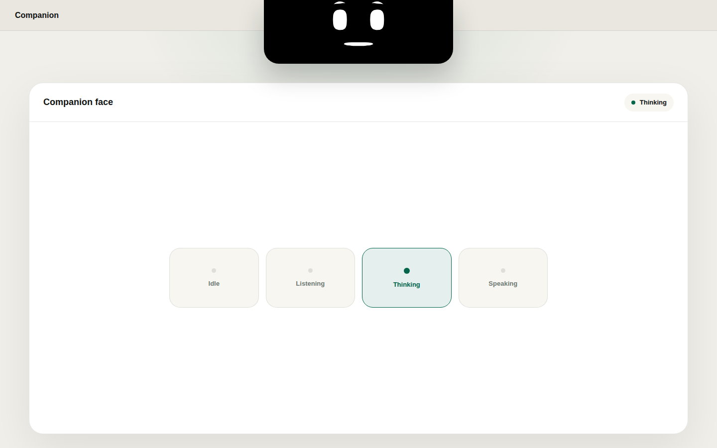 Mac Companion screen with a face in the notch and Idle Listening Thinking Speaking tiles, Thinking selected